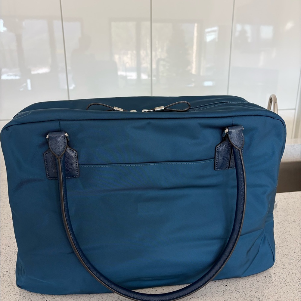 TUMI Navy Carry-On. Never used. Plastic still on inside zip. - Picture 3 of 7